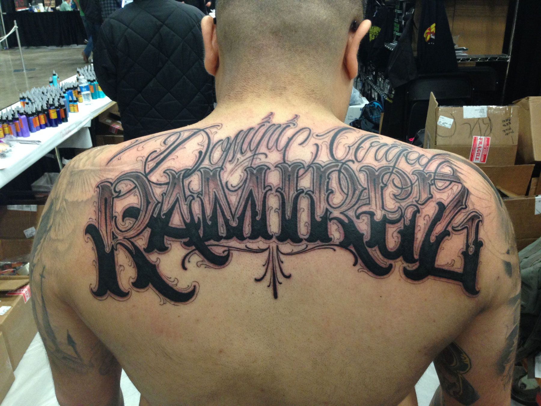 Татуировки мужские на спине Спаси и сохрани
