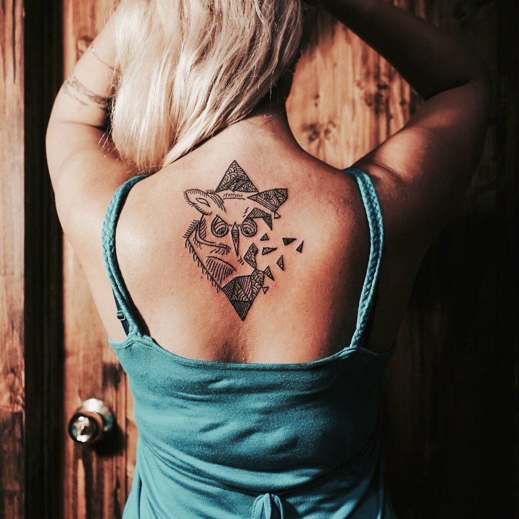 Самые популярные тату на спине для девушек