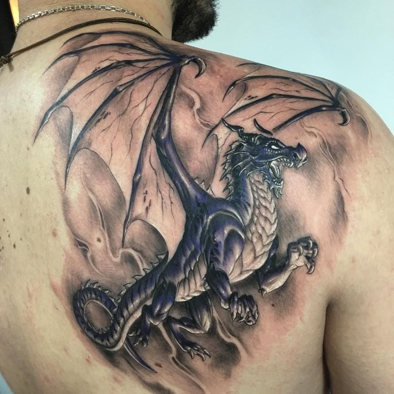Татуировки дракона на лопатке мужские