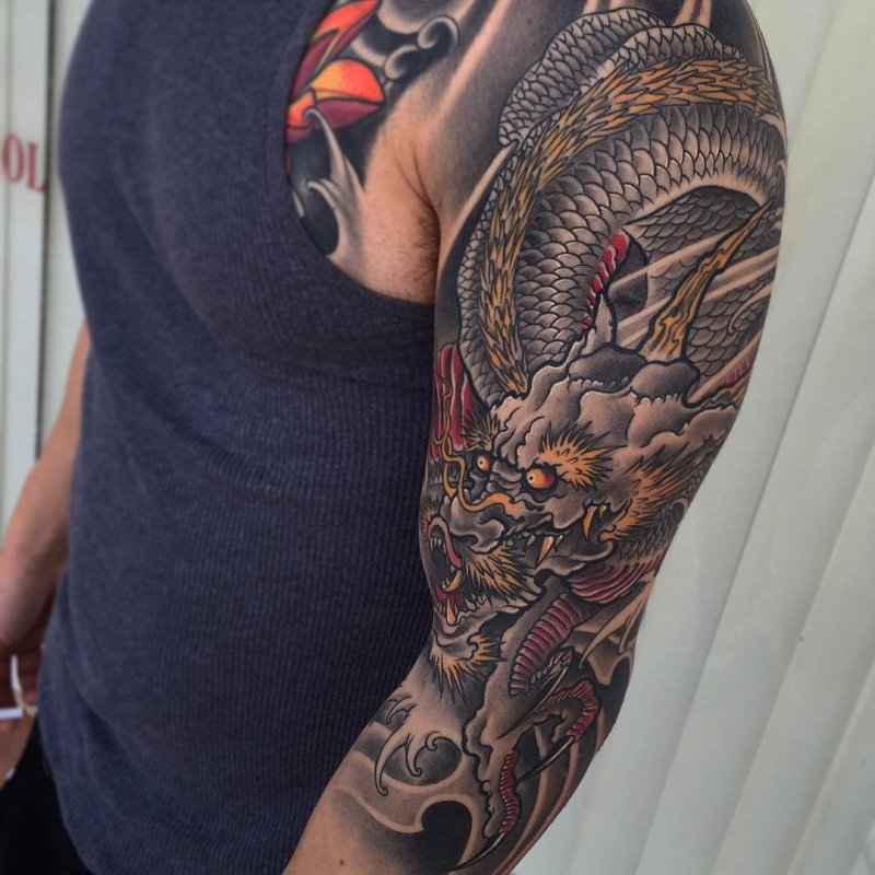 Мужские татуировки дракона на плече ( фото)
