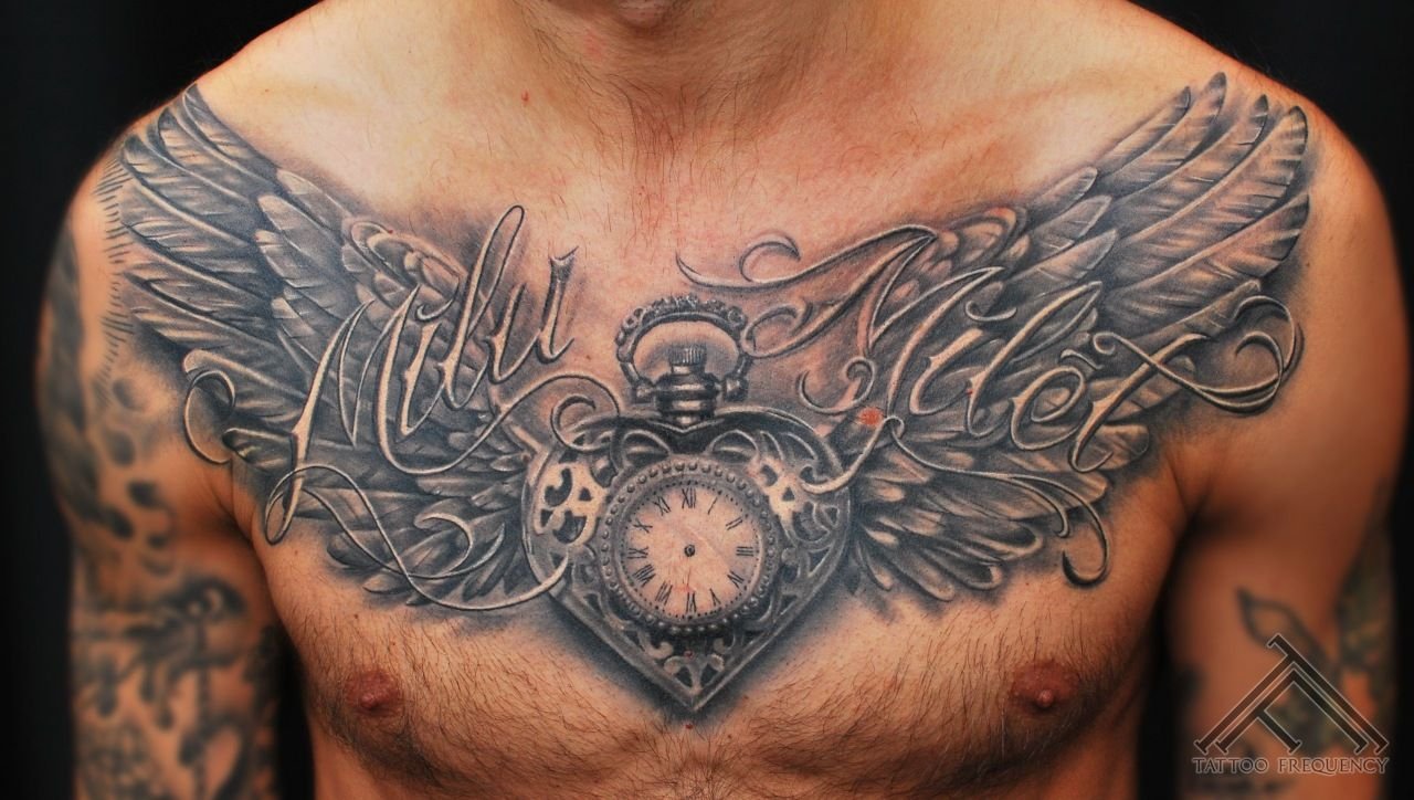 татуировки для мужчин крыло на груди фото 81