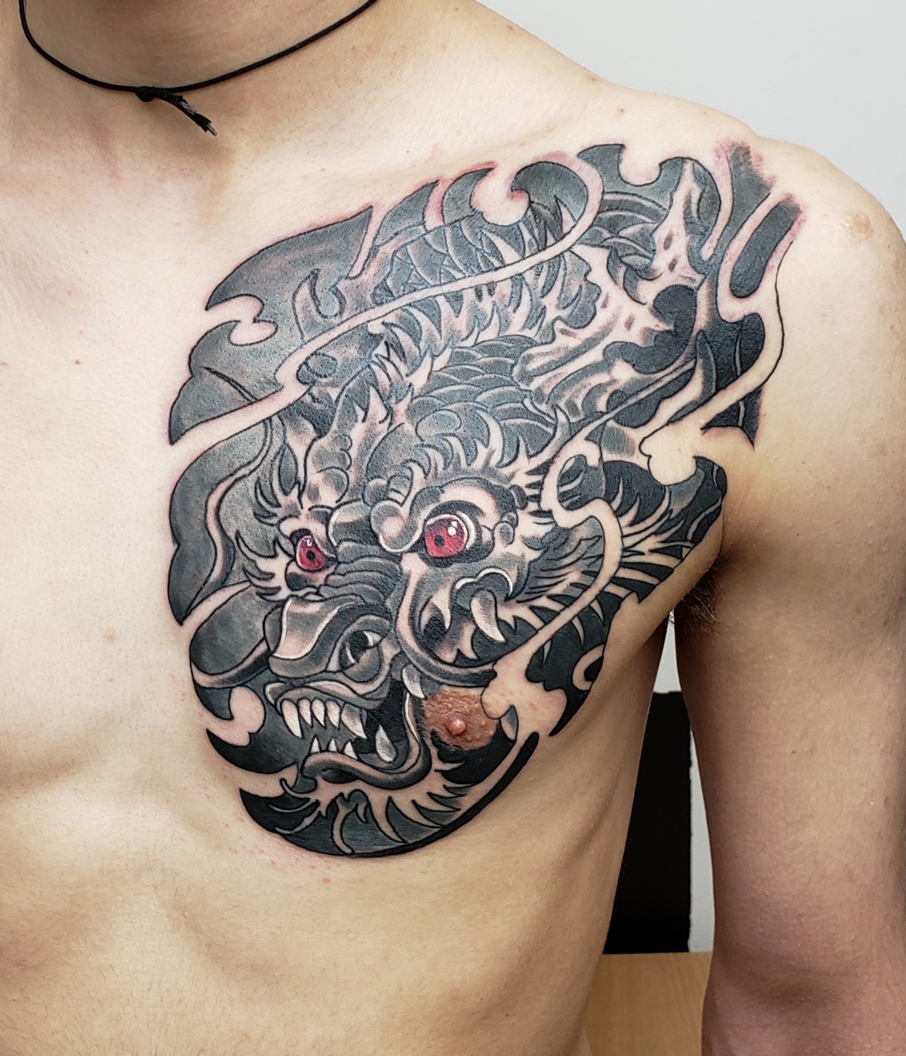 татуировки для мужчин драконы на груди фото 19
