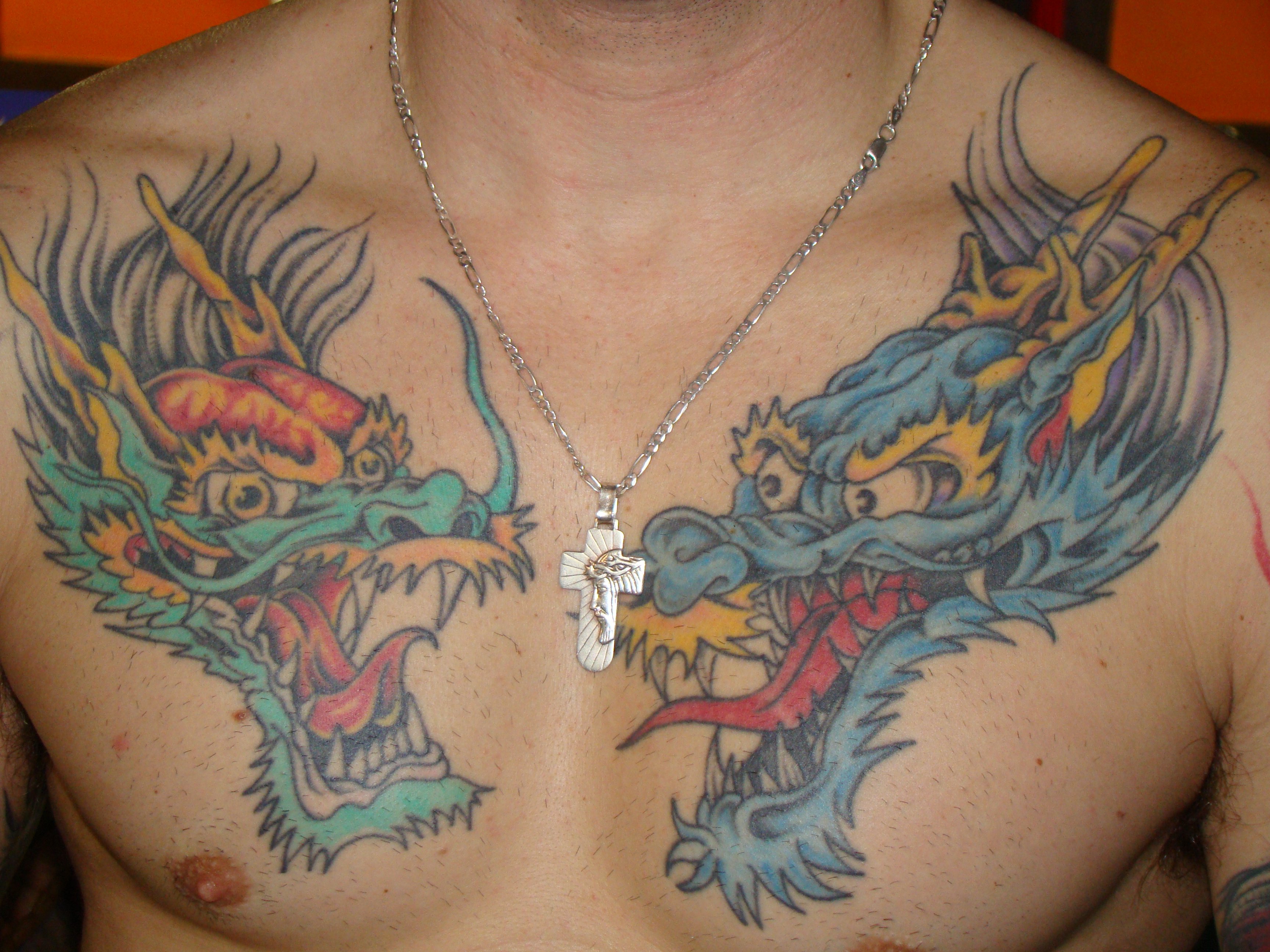 татуировки для мужчин драконы на груди фото 84