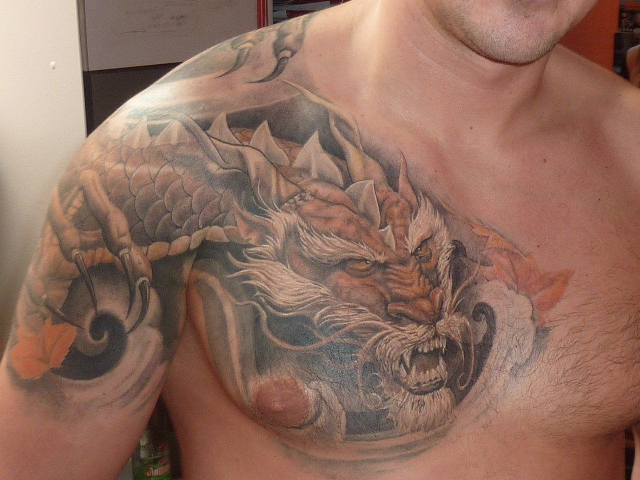 татуировки для мужчин драконы на груди фото 26