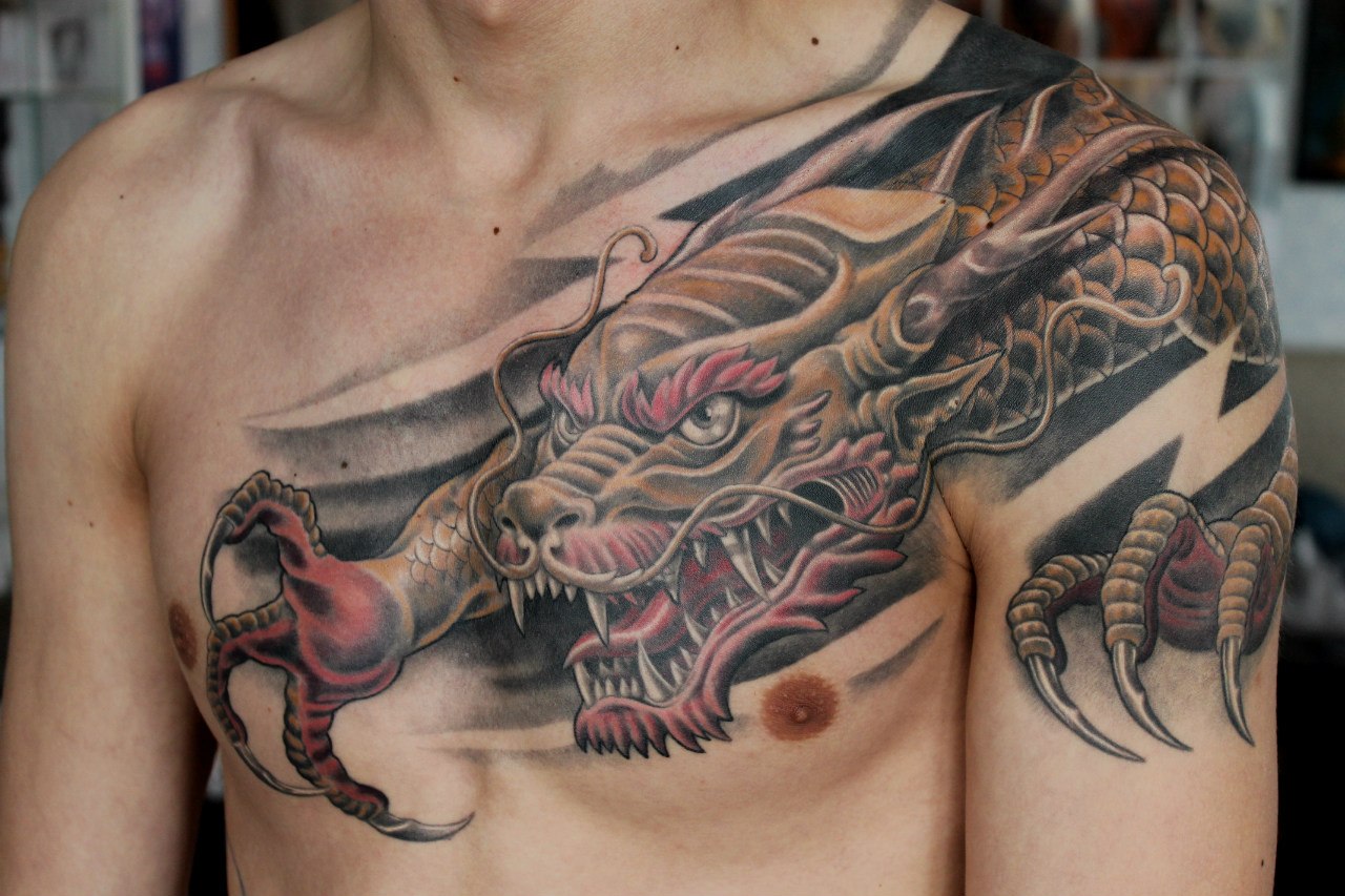 татуировки для мужчин драконы на груди фото 21