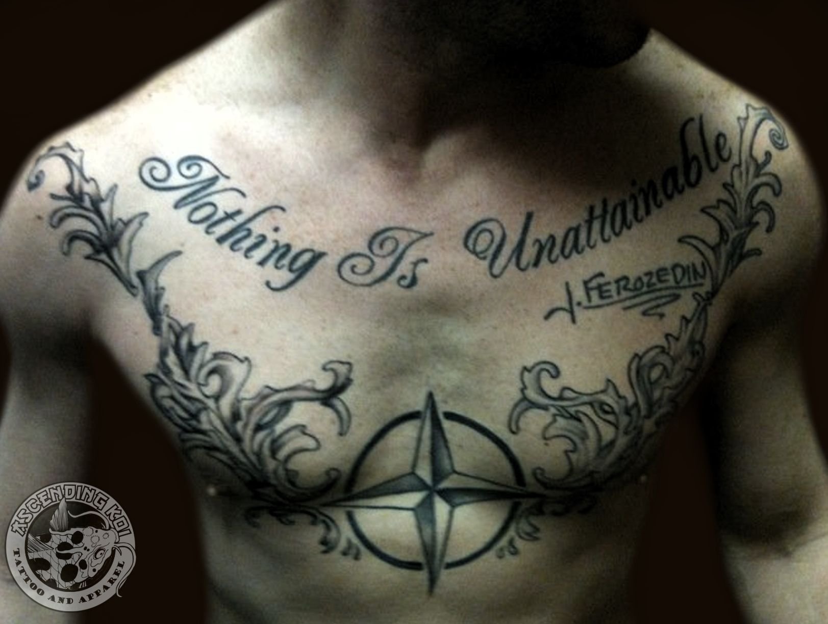 татуировки для мужчин на грудь надписи фото 83