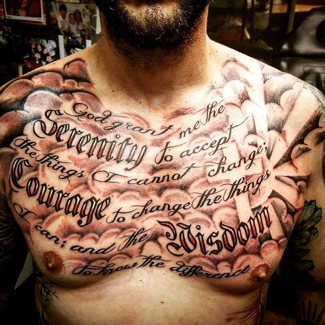 татуировки для мужчин на грудь надписи фото 76