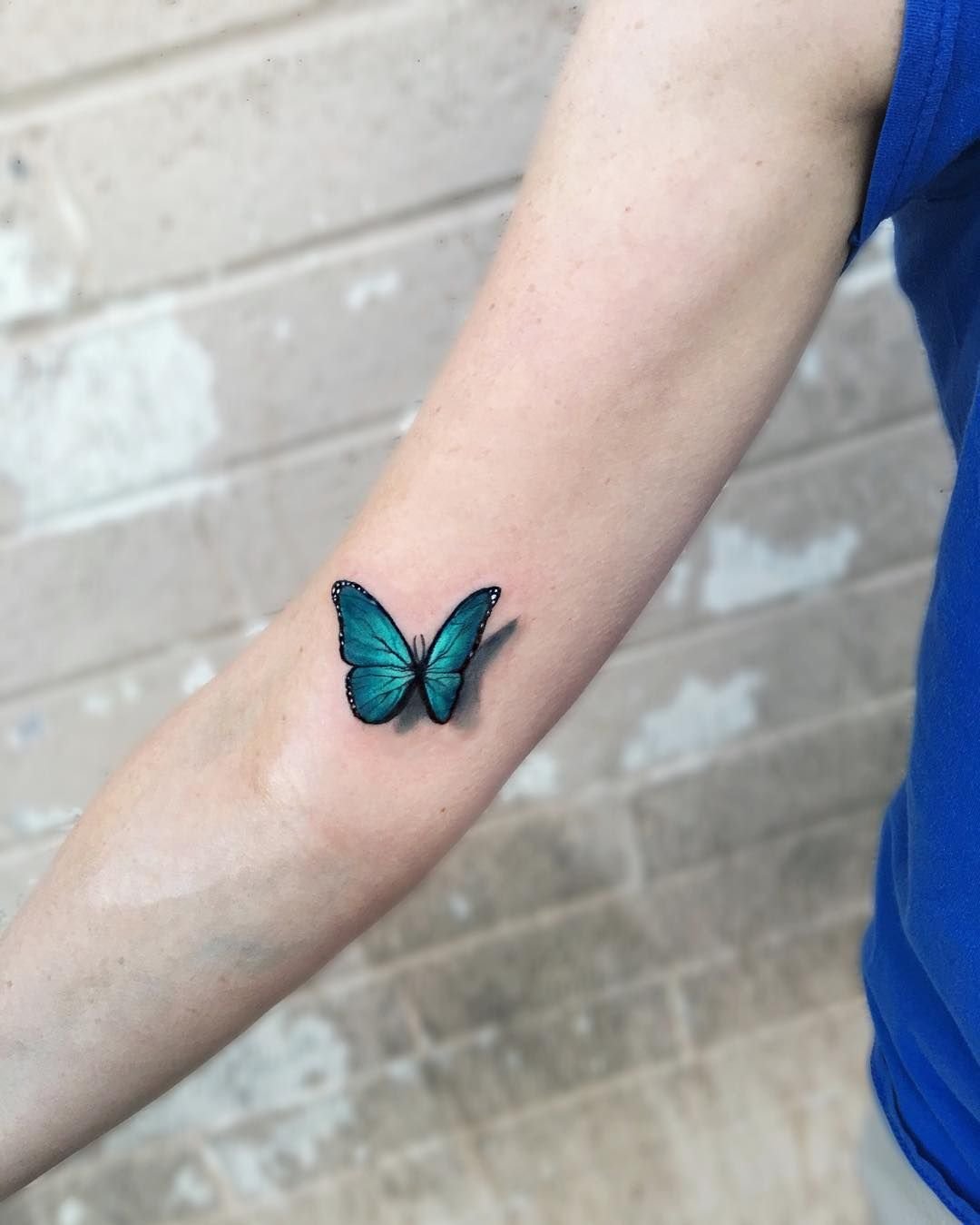 Татуировка бабочка.