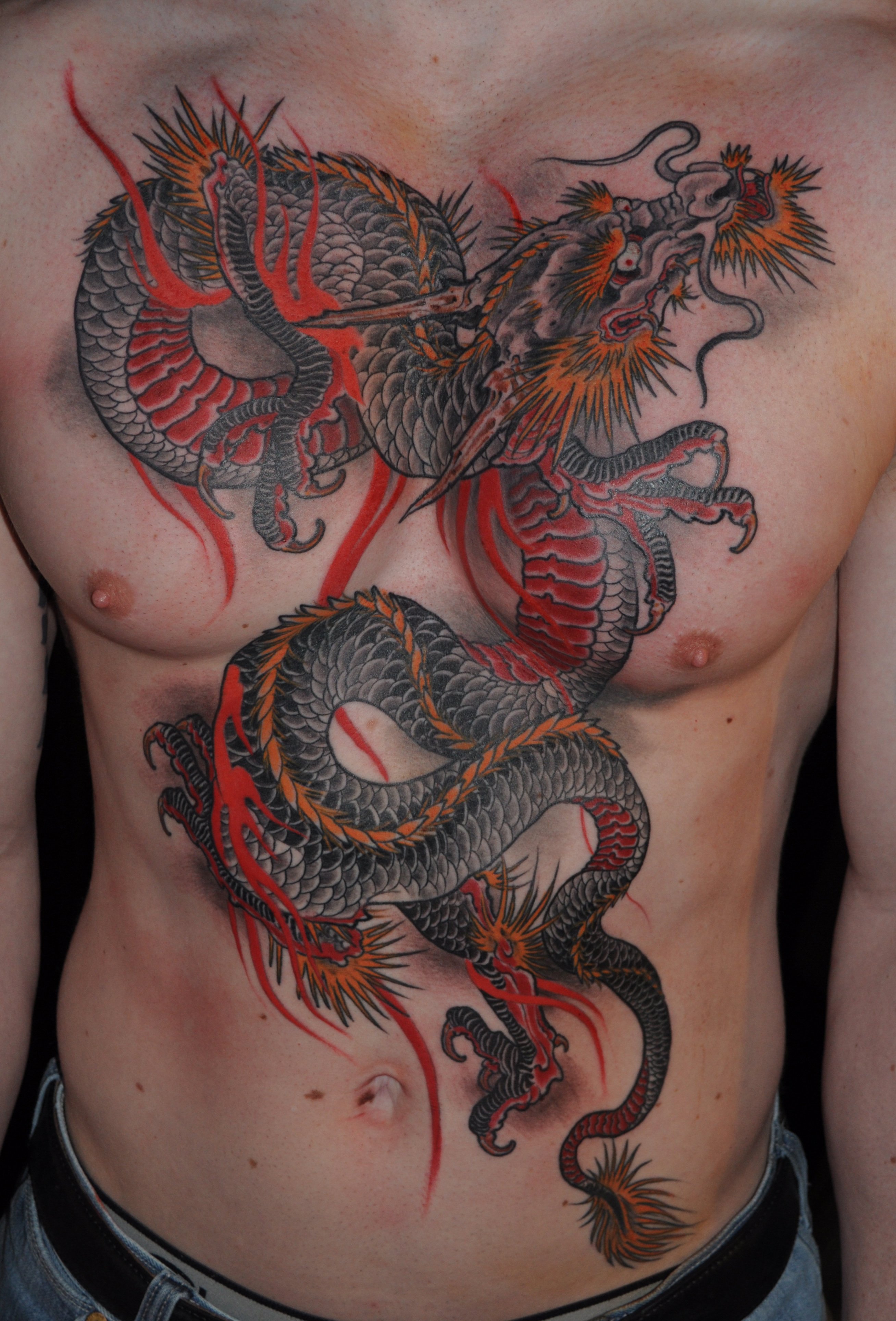 татуировки для мужчин драконы на груди фото 95