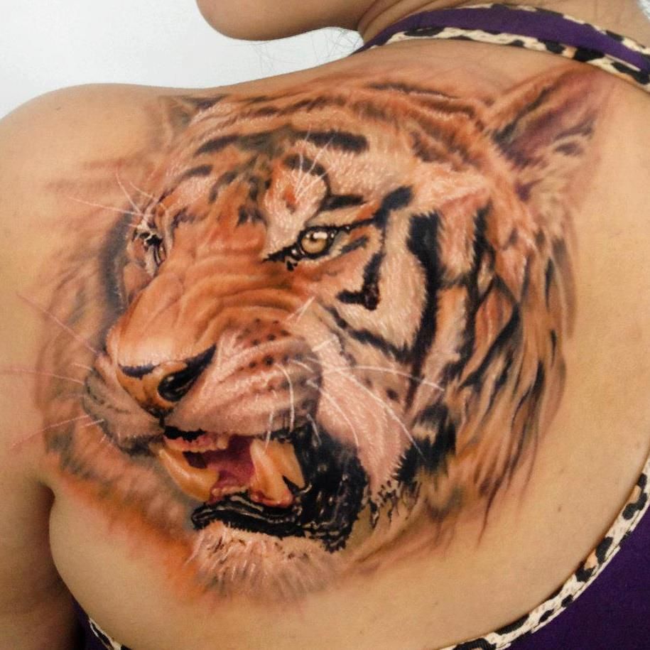 Татуировка оскал тигра значение на зоне