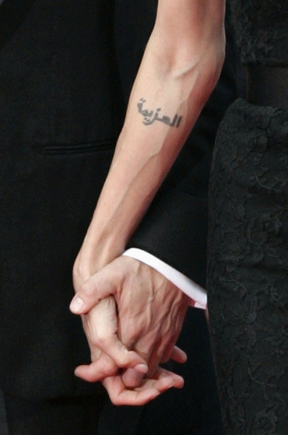 Тату Анджелины Джоли на руке
