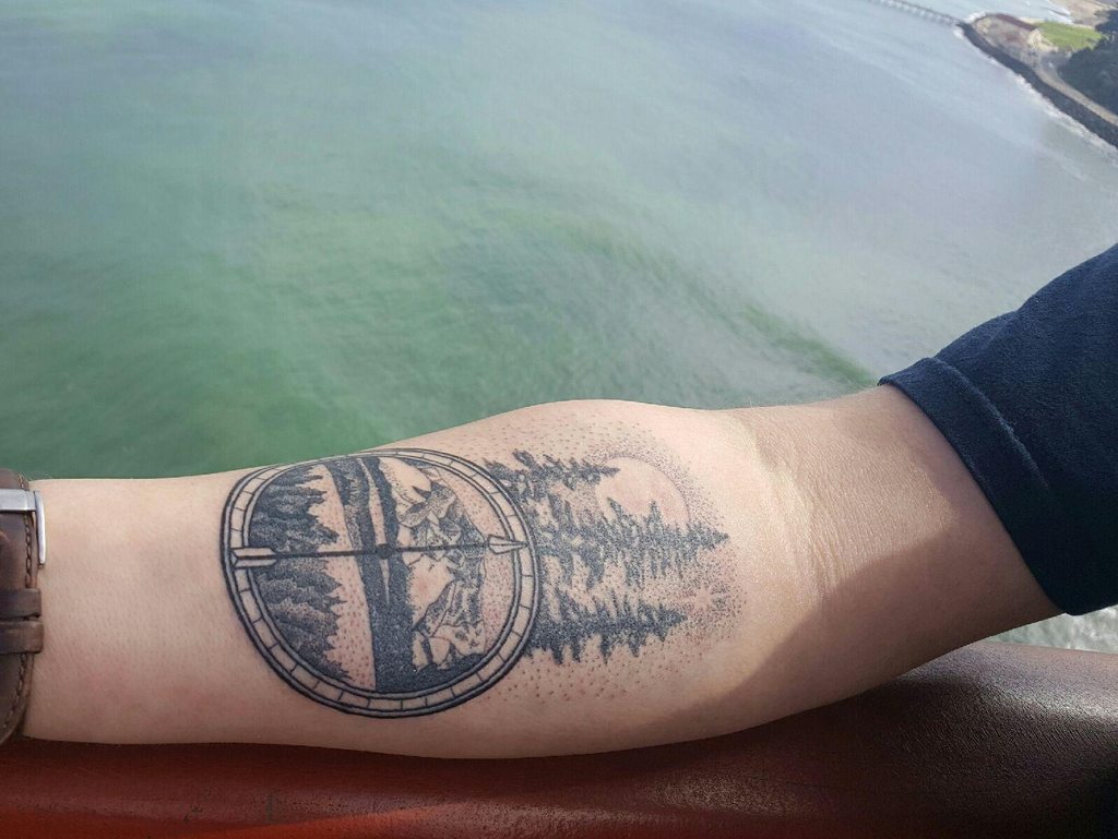 Татуировка Север на руке