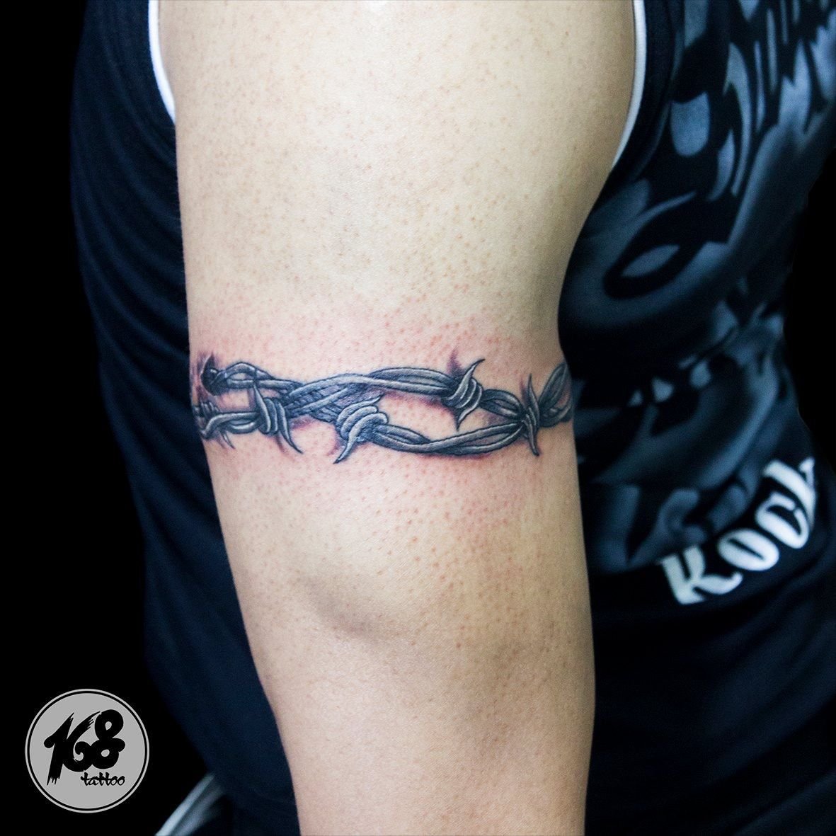 Символика татуировки колючая проволока на руке