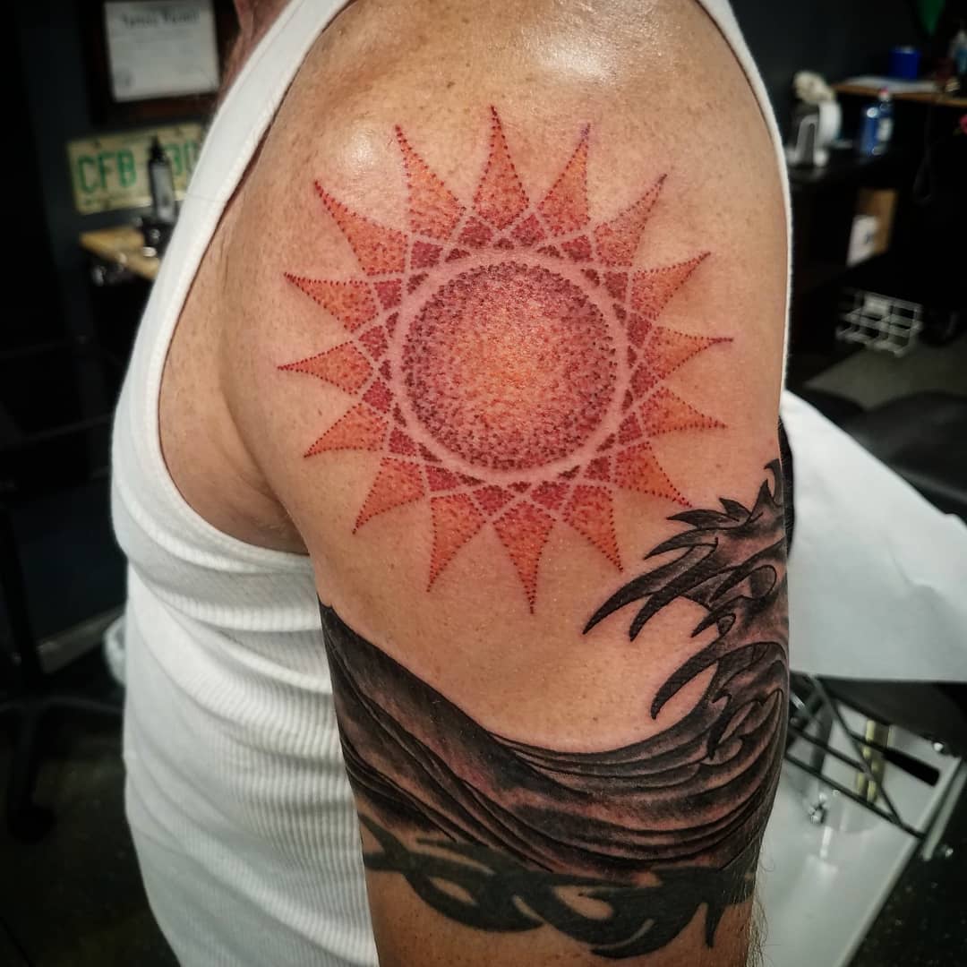 Языческое солнце тату