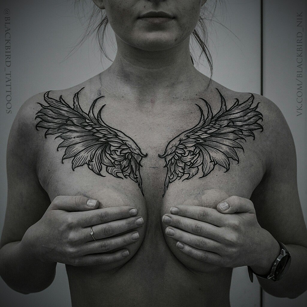 татуировки для мужчин крыло на груди фото 83
