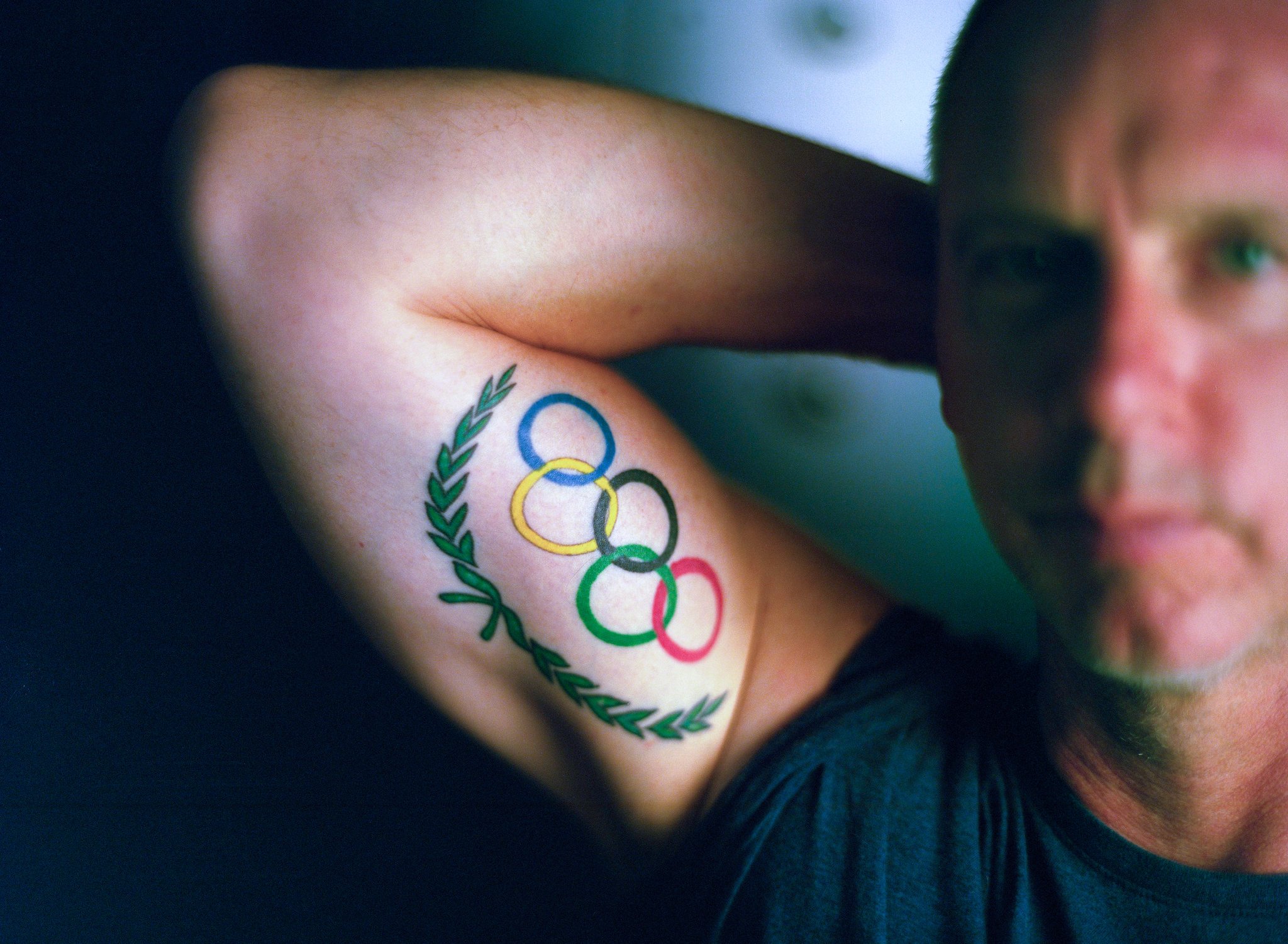 Тату Олимпийские кольца на руке