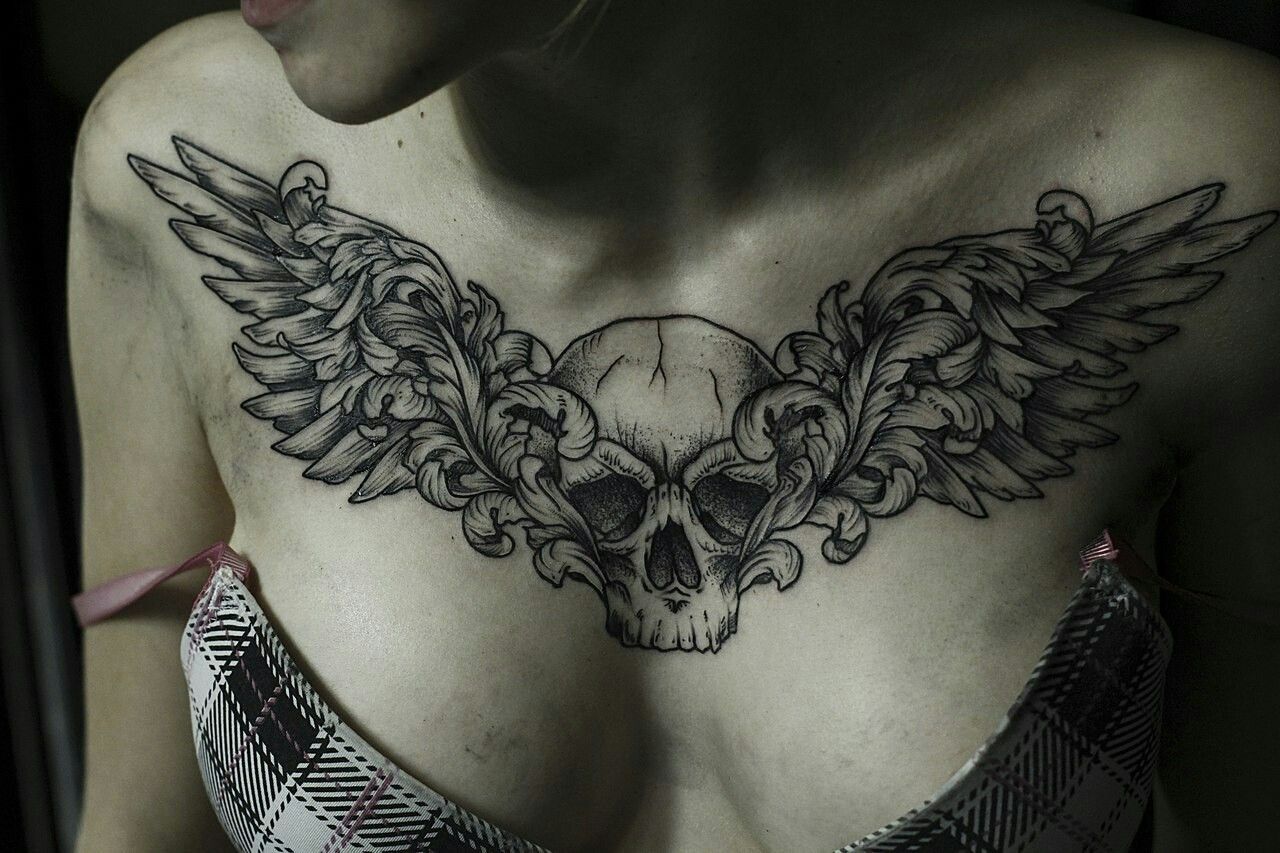 татуировки для мужчин крыло на груди фото 90