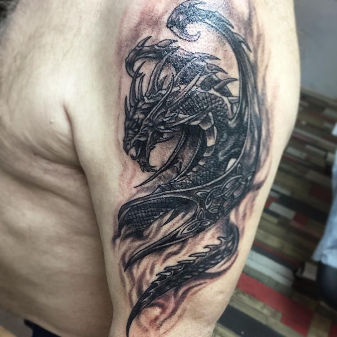 Татуировки дракона на руке мужские