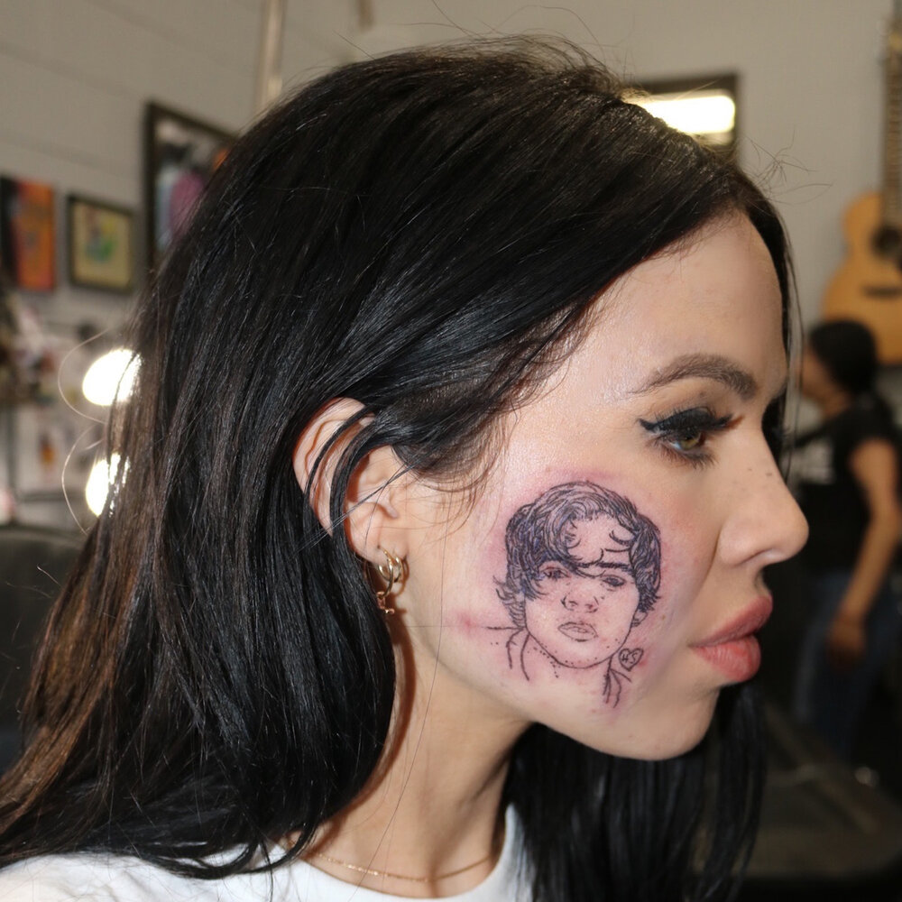 значение татуировки лицо