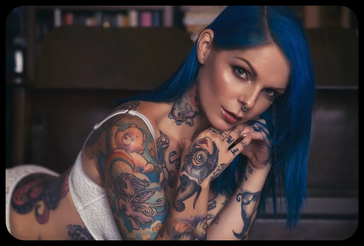 Татуированные девушки с пирсингом (52 фото)